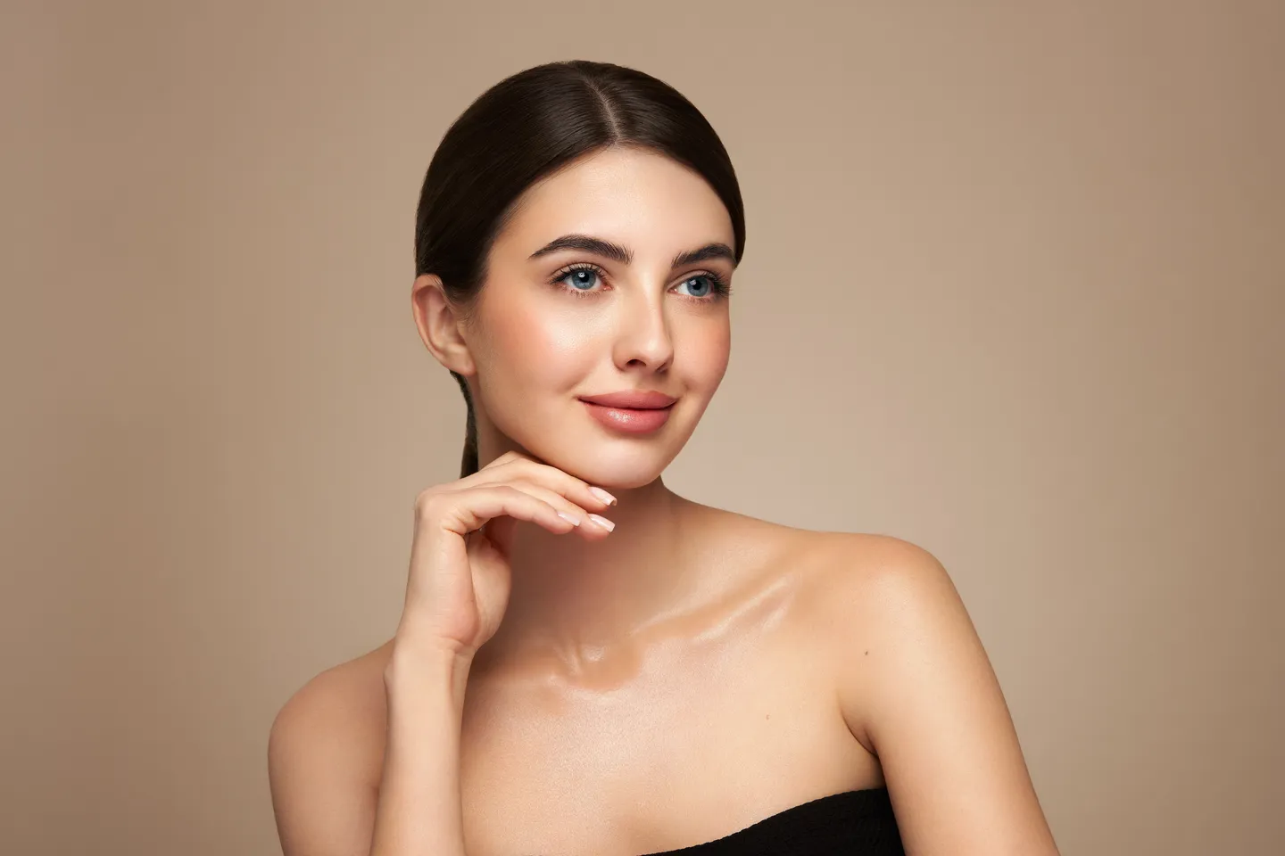 Woman smiling after cosmetic procedure at NorCal Plastic Surgery