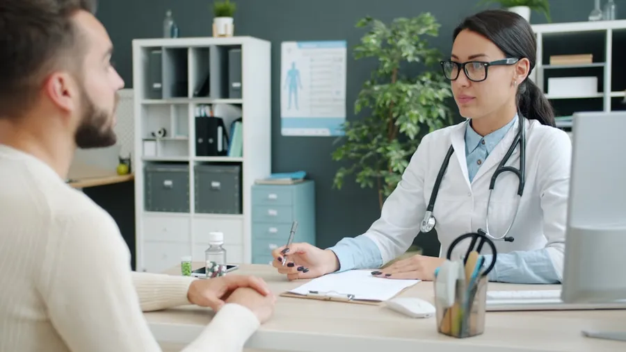 Patient and qualified clinician discussing skin tightening treatment options